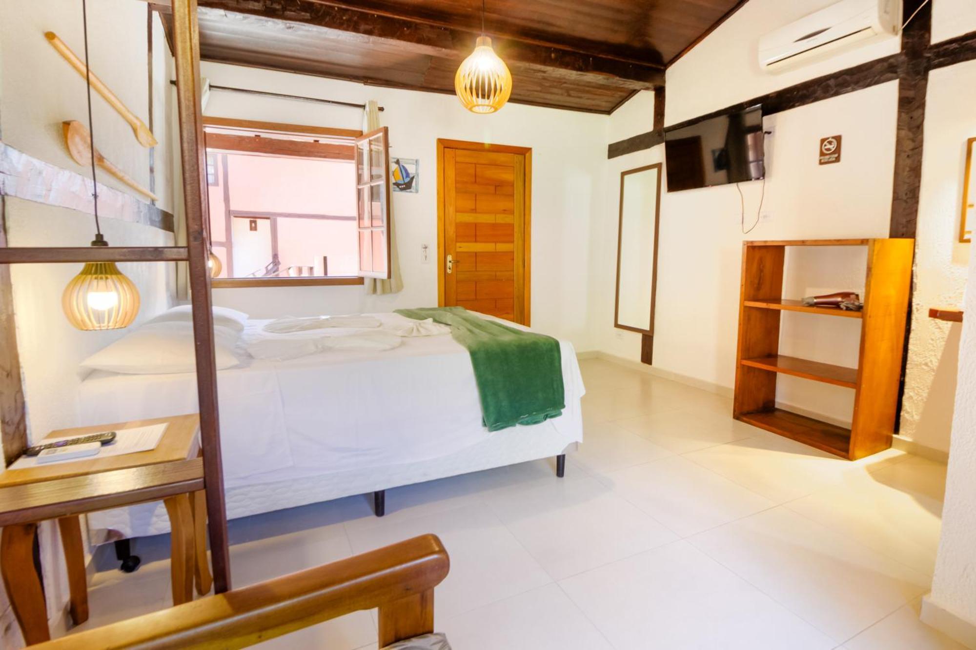 Velinn Pousada Canoa Ilhabela Habitación foto